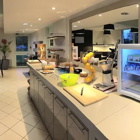 Отель Hotel Inn Design & Restaurant Le Mans Арнаж